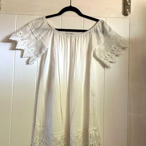 White mini dress with lace detail